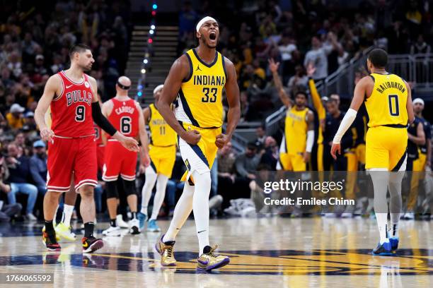 Myles Turner of the Indiana Pacers celebrates a three-pointer during the second half against the Chicago Bulls at Gainbridge Fieldhouse on October...