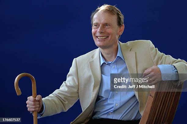 Andrew Marr, journalist and broadcaster appears for a portrait at the Edinburgh International Book festival on August 16, 2013 in Edinburgh,...