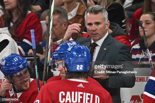 Head coach of the Montreal Canadiens, Martin St-Louis, handles bench duties during overtime against the Winnipeg Jets at the Bell Centre on October...