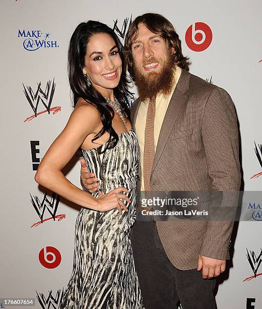 Diva Brie Bella and wrestler Daniel Bryan attend the WWE SummerSlam VIP party at Beverly Hills Hotel on August 15, 2013 in Beverly Hills, California.