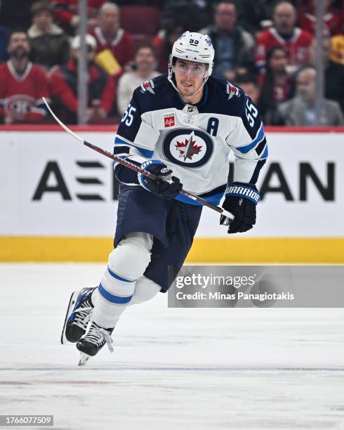 Mark Scheifele of the Winnipeg Jets skates during the third period against the Montreal Canadiens at the Bell Centre on October 28, 2023 in Montreal,...