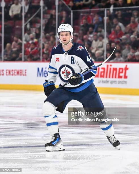 Josh Morrissey of the Winnipeg Jets skates during the third period against the Montreal Canadiens at the Bell Centre on October 28, 2023 in Montreal,...