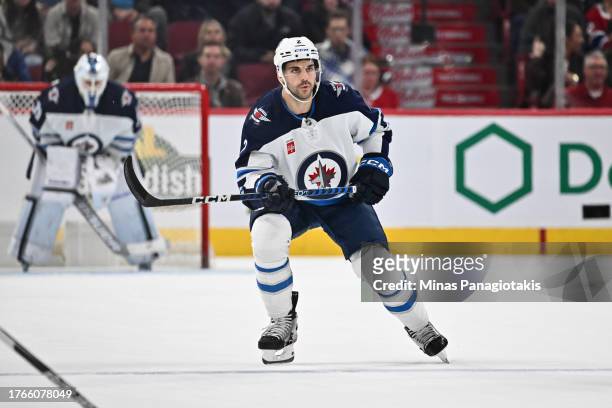 Dylan DeMelo of the Winnipeg Jets skates during the third period against the Montreal Canadiens at the Bell Centre on October 28, 2023 in Montreal,...