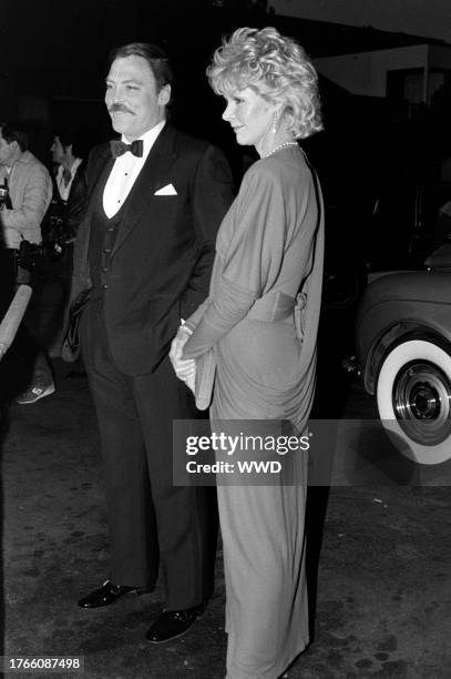 Stacy Keach and Jill Donahue attend an Academy Awards viewing party in Los Angeles, California, on April 11, 1983.