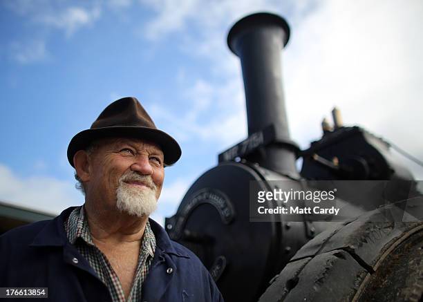 Charlie Daniel stands besides his 1918 Fowler steam engine that he is preparing to show at the Cornish Steam and Country Fair at the Stithians...