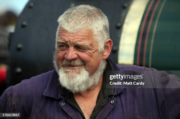 Robin Daniel smiles as he stands besides 'Janet' his 1922 Burrell steam engine that he is preparing to show at the Cornish Steam and Country Fair at...