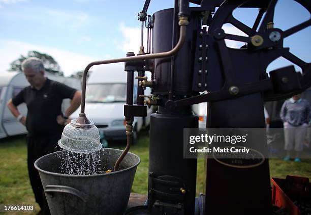 Stationary engine is shown at the Cornish Steam and Country Fair at the Stithians Showground on August 16, 2013 near Penryn, England. The annual...