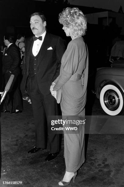 Stacy Keach and Jill Donahue attend an Academy Awards viewing party in Los Angeles, California, on April 11, 1983.