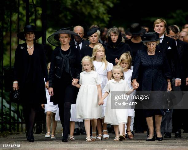 Dutch Princess Mabel Wisse-Smit walks with her daughters Luana and Zaria, Princess Beatrix, the royal family and guests to the Stulp Church in Lage...