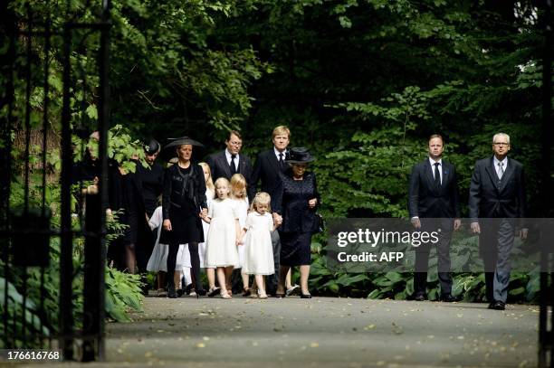 Dutch Princess Mabel Wisse-Smit walks with her daughters Luana and Zaria, Princess Beatrix, the royal family and guests to the Stulp Church in Lage...