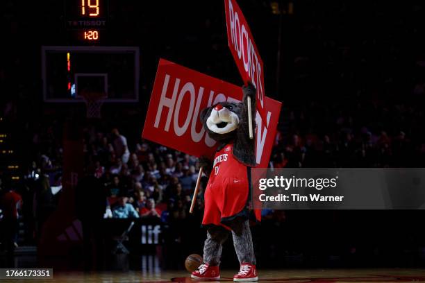 Houston Rockets mascot Clutch stands on the court during a time out against the Golden State Warriors at Toyota Center on October 29, 2023 in...