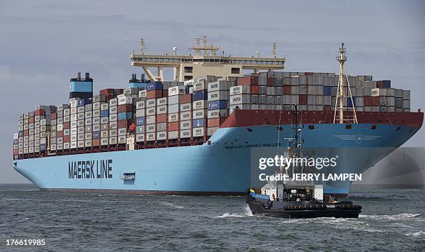 The world's biggest container ship, named the Maersk MC-Kinney Moller, arrives on August 16, 2013 at the port of Rotterdam, in the Netherlands. The...