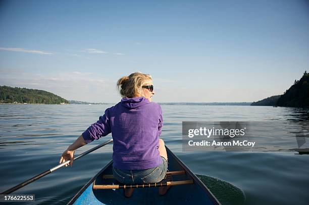 canoe on the sound - puget sound stock pictures, royalty-free photos & images