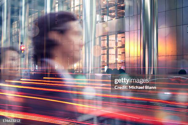 high flying executives in city at night - london workers stock pictures, royalty-free photos & images