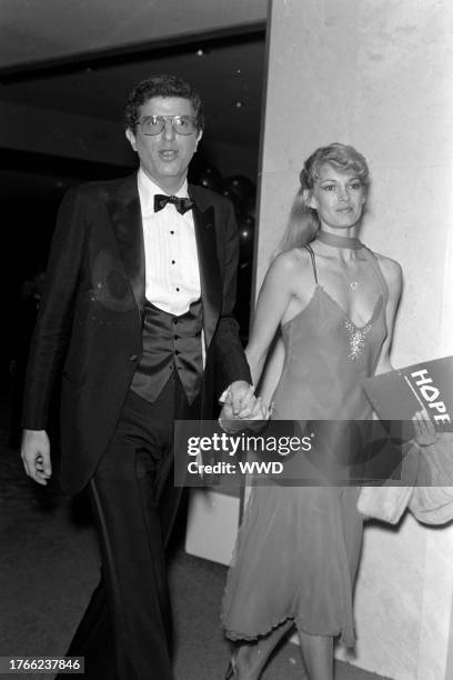 Marvin Hamlisch and Cyndy Garvey attend the "Million Dollar Evening" fundraiaser at Jones Hall in Houston, Texas, on February 28, 1983.