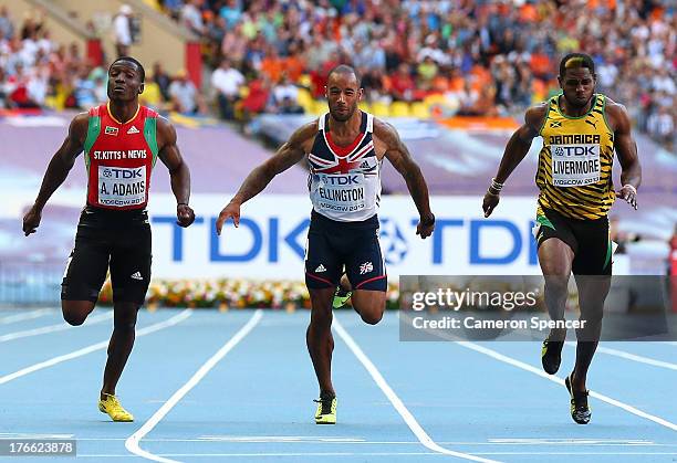 Antoine Adams of Saint Kitts and Nevis, James Ellington of Great Britain and Jason Livermore of Jamaica competes in the Men's 200 metres semi finals...