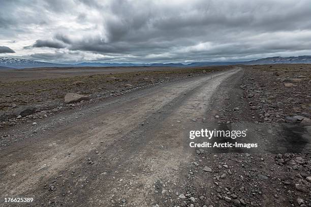 empty road in a deserted area, iceland - kaldidalur stock pictures, royalty-free photos & images