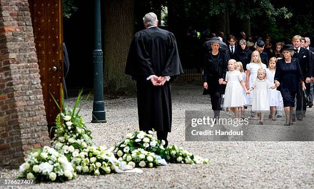 In this handout image provided by ANP, Princess Mabel of the Netherlands walks with her daughters Countess Luana and Countess Zaria of the...