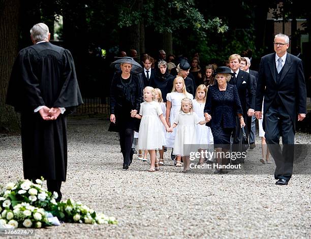 In this handout image provided by ANP, Princess Mabel of the Netherlands walks with her daughters Countess Luana and Countess Zaria of the...