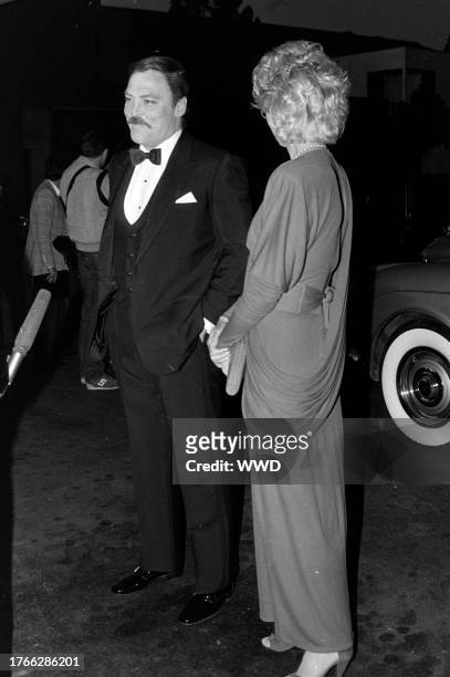 Stacy Keach and Jill Donahue attend an Academy Awards viewing party in Los Angeles, California, on April 11, 1983.
