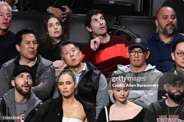 Ashley Benson and Brandon Davis attend a basketball game between the Los Angeles Lakers and the Orlando Magic at Crypto.com Arena on October 30, 2023...