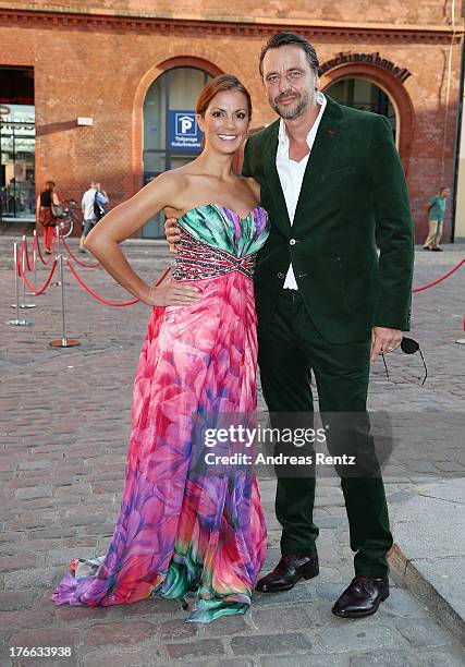 Kerstin Linnartz and partner attend the 12th Audi Classic Open Air during the AUDI Sommernacht at Kulturbrauerei on August 16, 2013 in Berlin,...