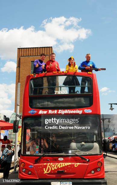 Lachlan Gillespie, Simon Pryce, Emma Watkins and Anthony Field of The Wiggles attend Meet The Wiggles at Pier 78 on August 16, 2013 in New York City.