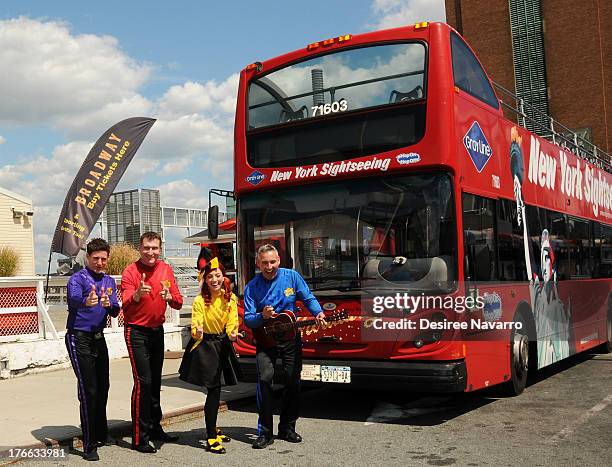 Lachlan Gillespie, Simon Pryce, Emma Watkins and Anthony Field of The Wiggles attend Meet The Wiggles at Pier 78 on August 16, 2013 in New York City.