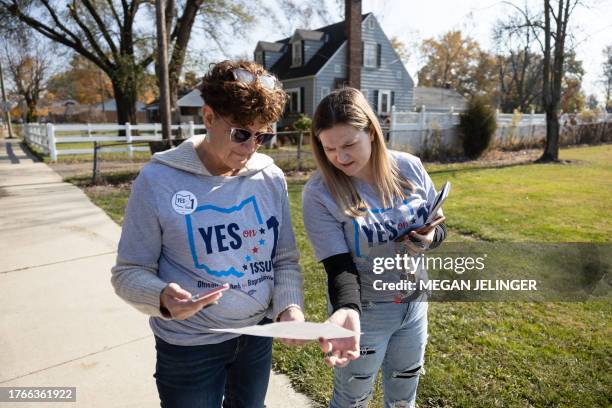 Pro-Choice canvasser Summer McLain and her mother Lorie McLain look at a map of a neighborhood before canvassing ahead of the general election in...