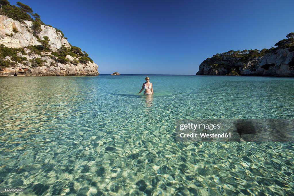 Spain, Menorca, Mature woman in sea