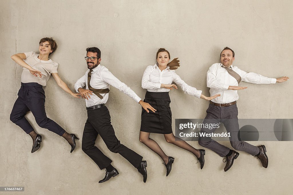 Business people dancing in office