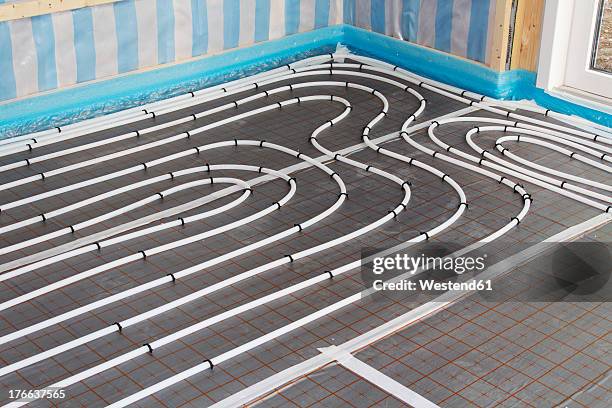 europe, germany, rhineland-palatinate, underfloor heating helixes while house building - electric floor heating stock pictures, royalty-free photos & images