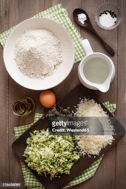 ingredients for making zucchini muffins on table - grated stock pictures, royalty-free photos & images