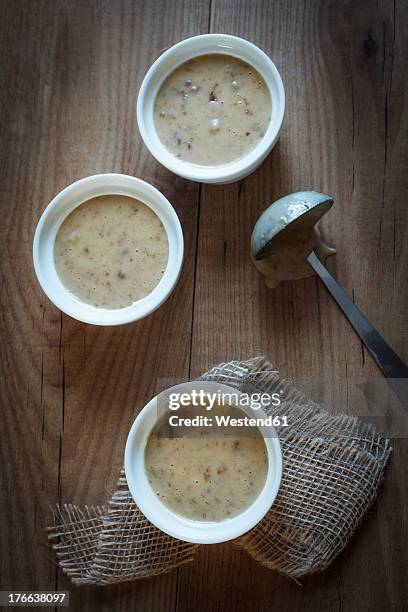 sticky toffee pudding in cups on table - toffee pudding stock pictures, royalty-free photos & images