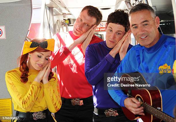 Emma Watkins, Simon Pryce, Lachlan Gillespie and Anthony Field of The Wiggles attend Meet The Wiggles at Pier 78 on August 16, 2013 in New York City.