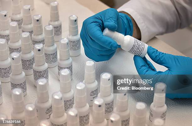 Ken Kirby, president of Transdermal Delivery Solutions, holds a tester spray bottle of testosterone, in Palm Beach Gardens, Florida, U.S., on Friday,...