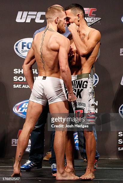 opponents-conor-mcgregor-and-max-holloway-face-off-during-the-ufc-weigh-in-inside-td-garden-on.jpg