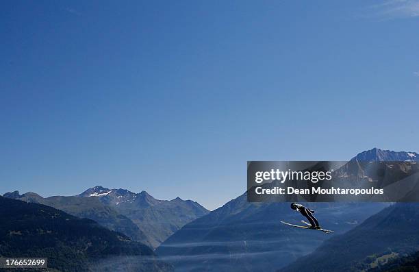 Tom Hilde of Norway competes in the FIS Ski Jumping Grand Prix Mens Large Hill Individual Qualification on August 15, 2013 in Courchevel, France.