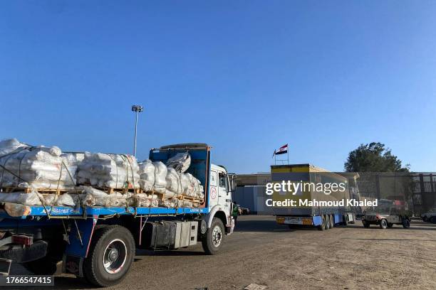 Aid convoy trucks cross the Rafah border from the Egyptian side on November 6, 2023 in Rafah, Egypt. Since the outbreak of war between Israel and...