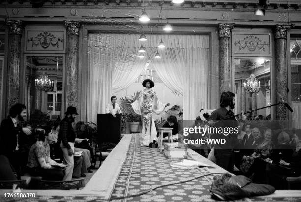 Singer Diana Ross, producer Barry Gordy and cast on set during the filming of Mahogony.