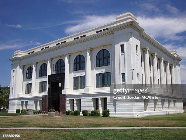 This courthouse was built in 1917 in Classical Revival style. I like the structure's Ionic columns. It was designed by W. E. Hulse and was built by...