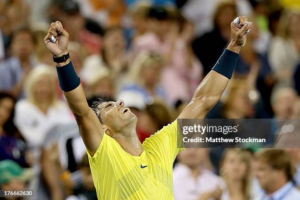 Rafael Nadal of Spain celebrate his win over Roger Federer of Switzerland during the Western & Southern Open on August 16, 2013 at Lindner Family...