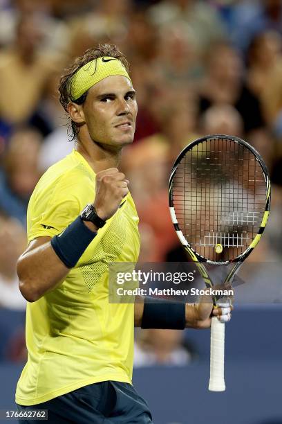 Rafael Nadal of Spain celebrate match point against Roger Federer of Switzerland during the Western & Southern Open on August 16, 2013 at Lindner...