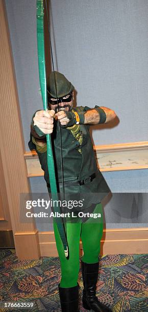 Cosplayer Garrett Gray as Green Arrow attends Day 1 Wizard World Chicago Comic Con held at Donald E. Stephens Convention Center on August 9, 2013 in...