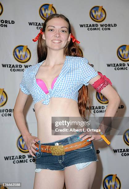 Cosplayer Gen O'Brian as Dorothy attends Day 1 Wizard World Chicago Comic Con held at Donald E. Stephens Convention Center on August 9, 2013 in...