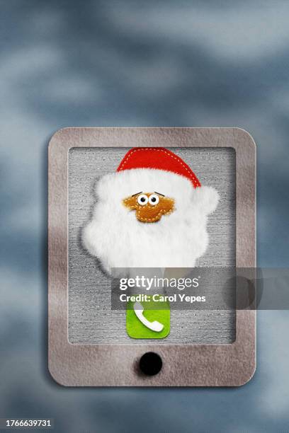 video call to santa claus in tablet - mrs claus costume stock pictures, royalty-free photos & images