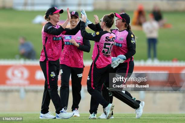 Mathilda Carmichael of the Sixers celebrates after taking a catch to dismiss Amy Jones of the Scorchers during the WBBL match between Perth Scorchers...