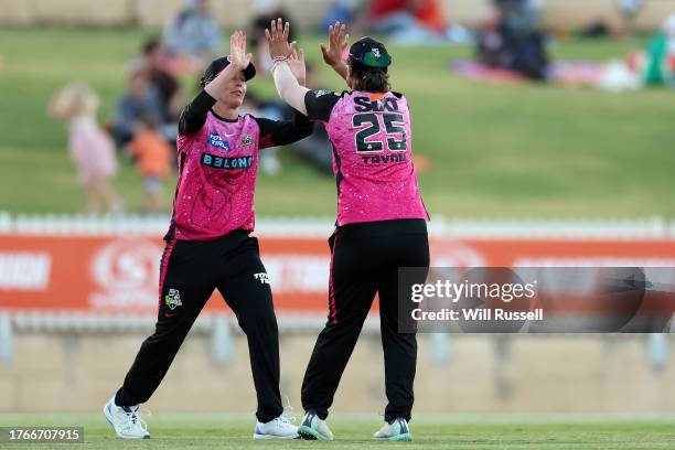 Mathilda Carmichael of the Sixers celebrates after taking a catch to dismiss Amy Jones of the Scorchers during the WBBL match between Perth Scorchers...