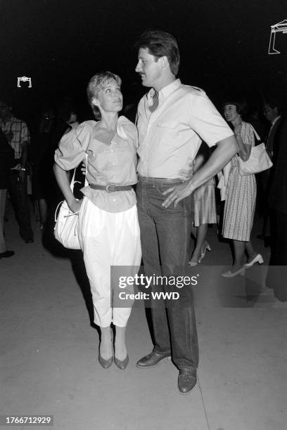 Kathryn Holcomb and Bruce Boxleitner attend a party, themed for the movie "Tron" and benefitting the California Institute of the Arts, on the Walt...