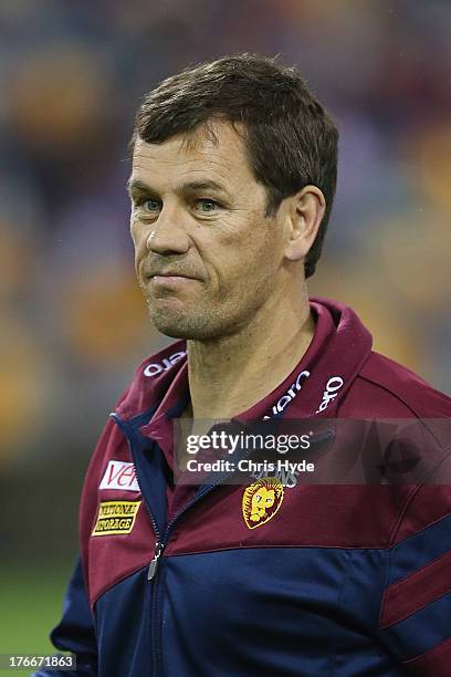 Interim Lions coach Mark Harvey looks on before the start of the round 21 AFL match between the Brisbane Lions and the Greater Western Sydney Giants...